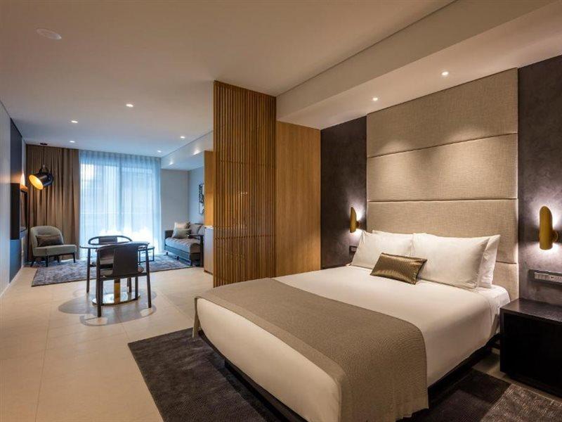 Skye Suites Сидней Экстерьер фото A bedroom at the hotel